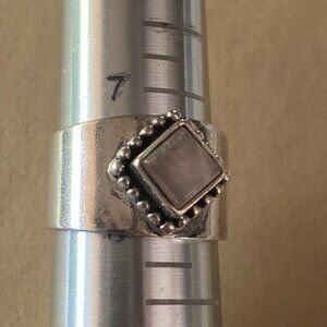 Bell Trading rose quartz gem in wide sterling silver setting